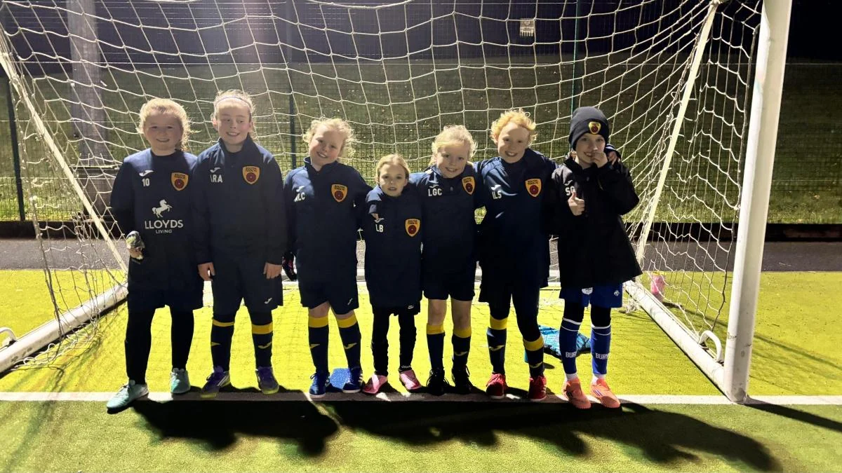 Bolton Town players together at an evening training session