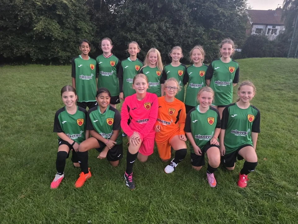 Bolton Town Goats squad in their dark green and black home kit
