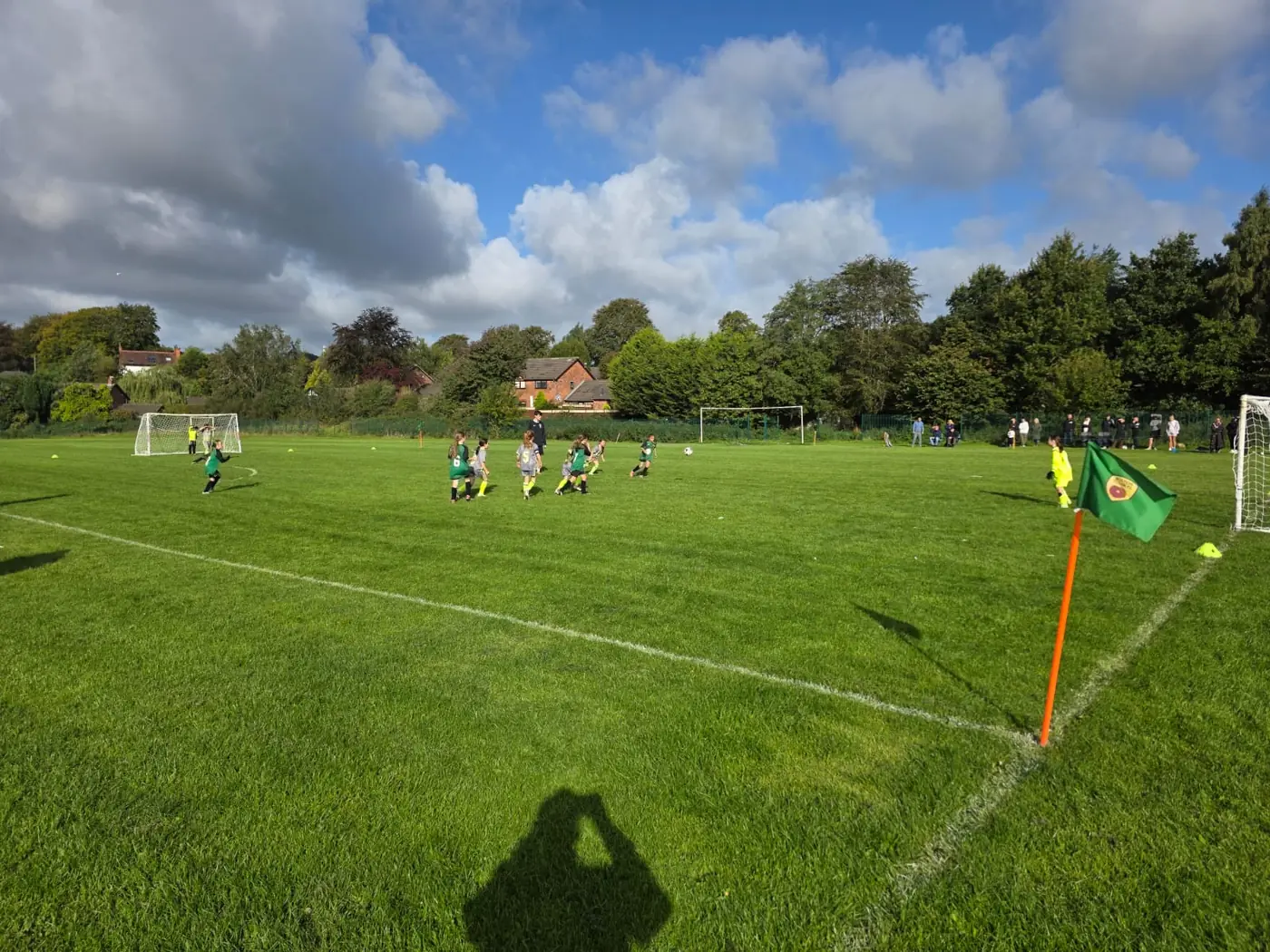 Real 5v5 grass match setup at Sharples showing the pitch, goals and full-size corner flag