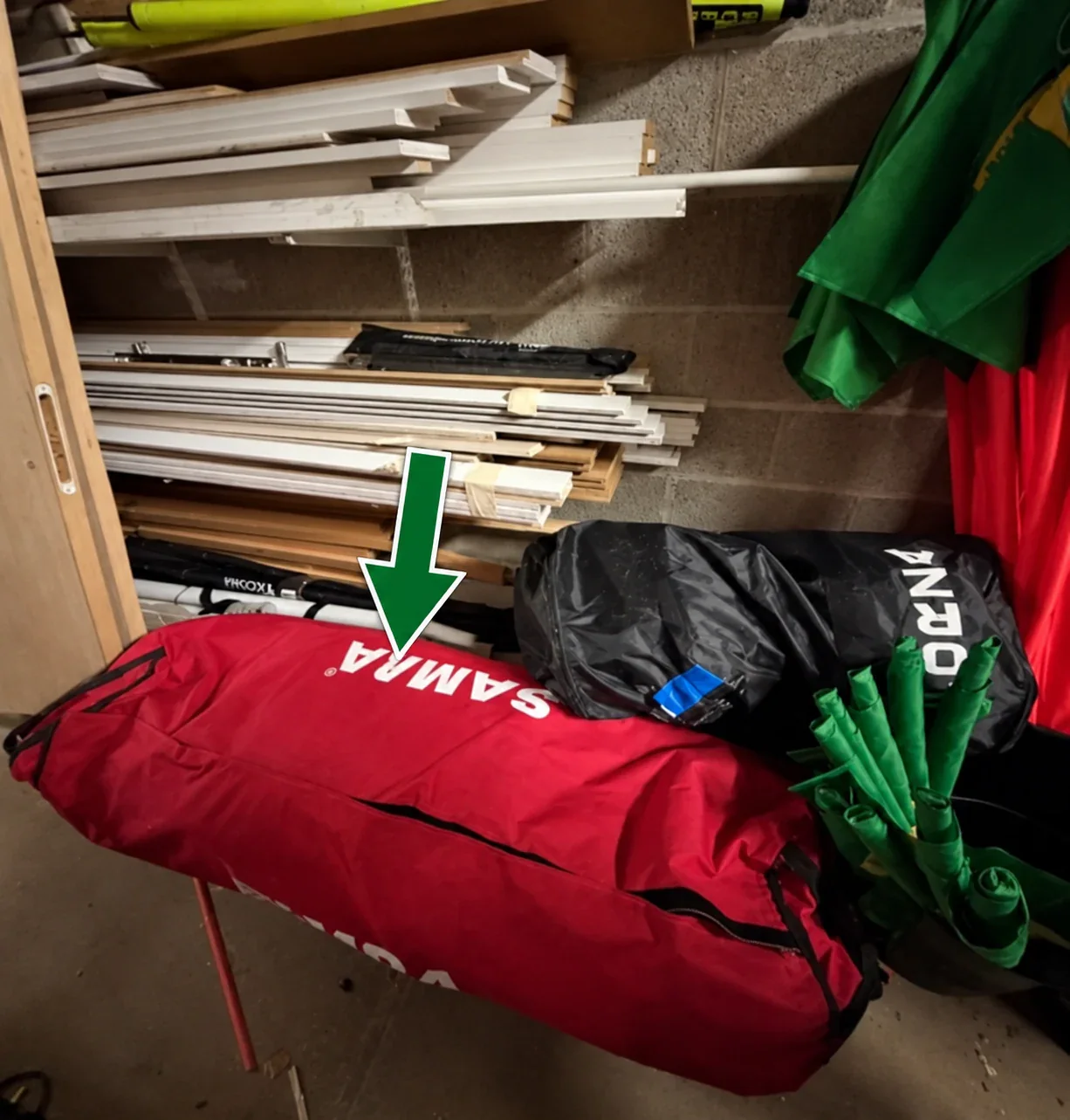 Red Samba bags containing spare 9v9 Samba nets